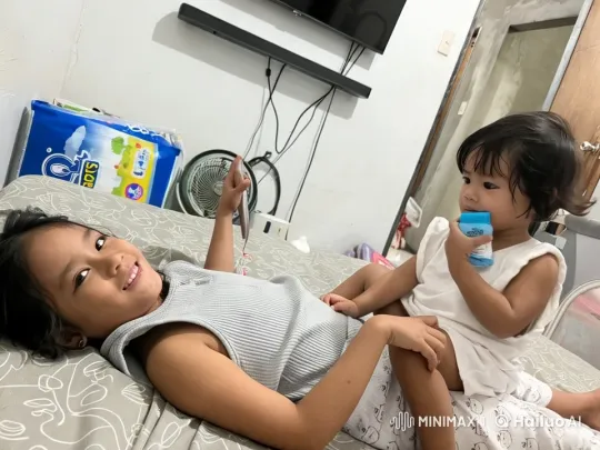 Siblings' Playful Kung Fu Sparring on Bed – AI Generated Video | Hailuo AI