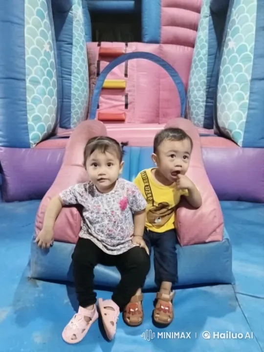 Children's Playful Kung Fu on Inflatable Slide – AI Generated Video | Hailuo AI