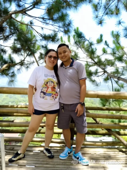 Couple Shares Intimate Moment on Scenic Wooden Platform – AI Generated Video | Hailuo AI