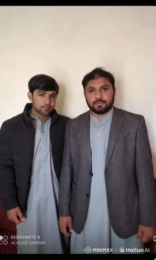 Two Men in Grey Shalwar Kameez with Minimalist Background – AI Generated Video | Hailuo AI