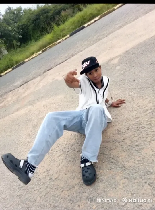 Young Man Performs Martial Arts on Outdoor Pavement – AI Generated Video | Hailuo AI