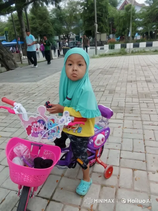 Child Prepares to Ride Decorated Bicycle in Park Setting – AI Generated Video | Hailuo AI
