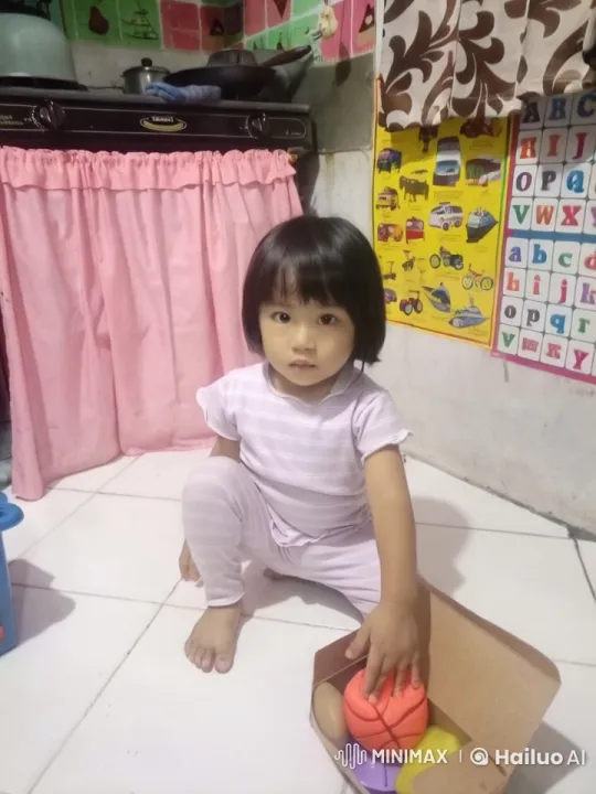 Child Practicing Kungfu in Cozy Kitchen Setting – AI Generated Video | Hailuo AI