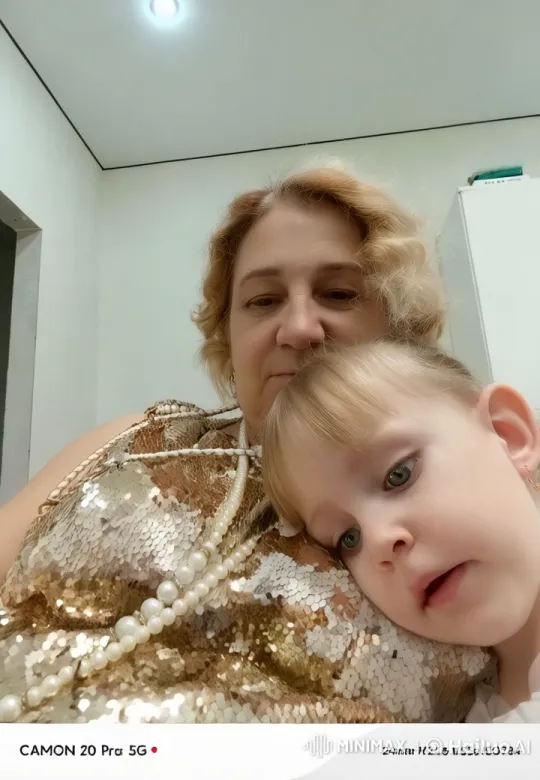 Woman Shows Affection to Girl in Gold Sequined Outfit – AI Generated Video | Hailuo AI