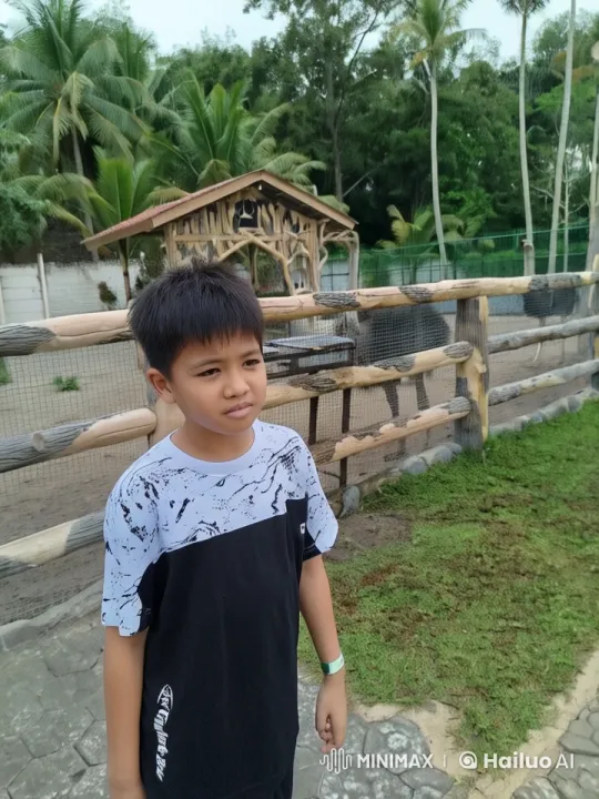 Young Boy Performing Kung Fu in Tranquil Setting – AI Generated Video | Hailuo AI
