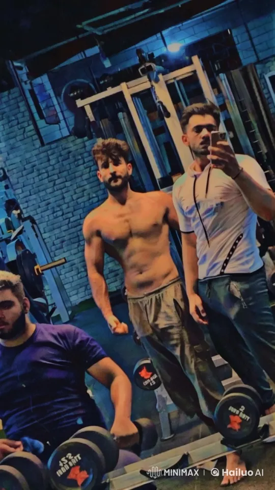 Two Men Spar in a Gym, Showcasing Athleticism and Friendship – AI Generated Video | Hailuo AI