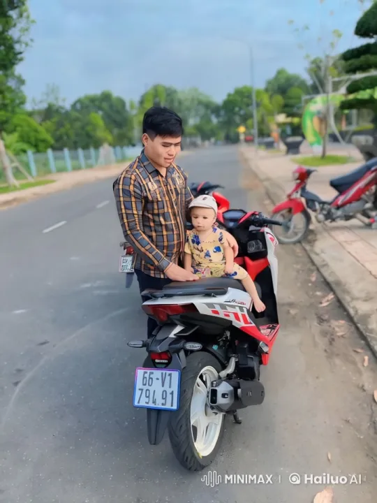 Father and Child's Playful Martial Arts on Motorcycle – AI Generated Video | Hailuo AI
