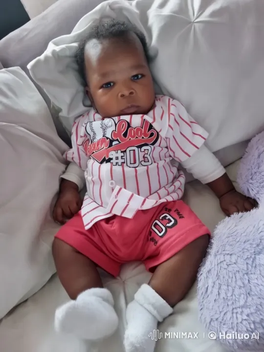 Child Practicing Playful Kung Fu in Sporty Striped Outfit – AI Generated Video | Hailuo AI