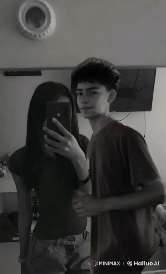 Boy and Girl Share Intimate Mirror Selfie Moment – AI Generated Video | Hailuo AI