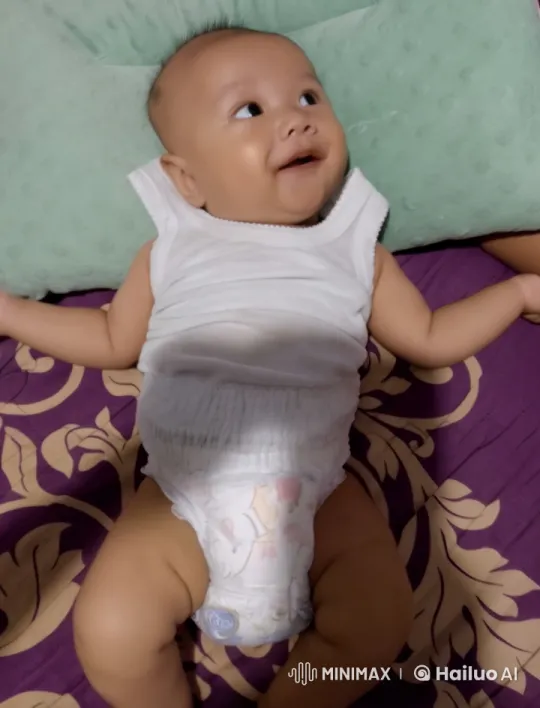 Baby Kungfu Moves on Purple Floral Bed – AI Generated Video | Hailuo AI
