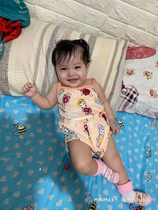 Baby Dancing Playfully on Colorful Bed – AI Generated Video | Hailuo AI