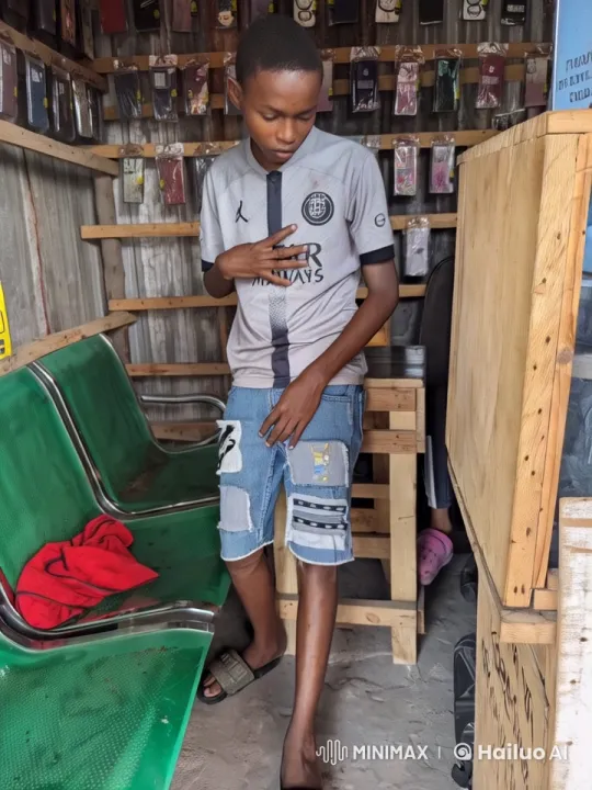 Young Man Transforms into Skull in Flaming Shop – AI Generated Video | Hailuo AI