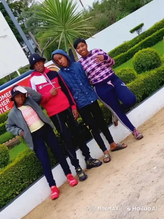 LIVE2D: Four Friends in a Serene Garden Setting – AI Generated Video | Hailuo AI