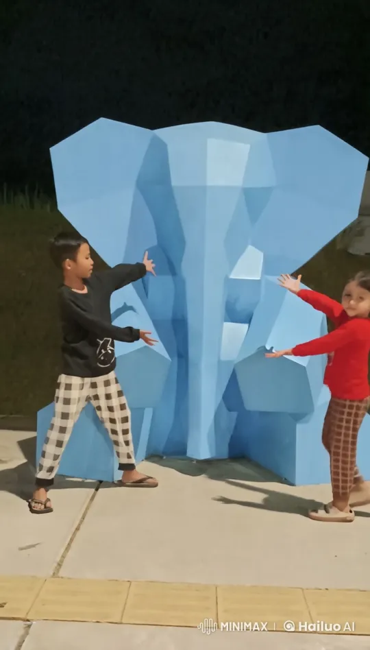 Children Display Energetic Kungfu Skills in Front of Sculpture – AI Generated Video | Hailuo AI