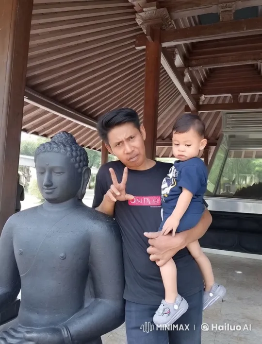 Martial Arts Performance with Toddler by Buddha Statue – AI Generated Video | Hailuo AI
