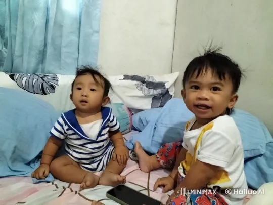 Children Playfully Engage in Kungfu Fight on Bed – AI Generated Video | Hailuo AI