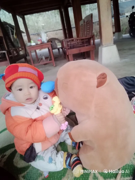 Toddler Plays with Stuffed Toy in Cozy Gazebo – AI Generated Video | Hailuo AI
