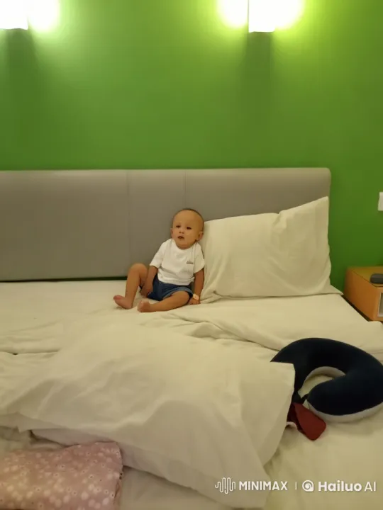 Baby's Playful Actions on a Vibrant Bed in Live2D Animation – AI Generated Video | Hailuo AI