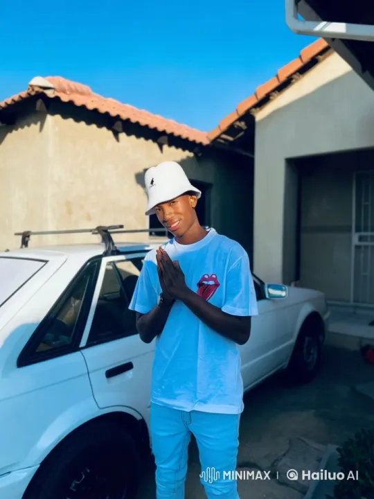 Young Kung Fu Practitioner Showcases Skills Near White Car and House – AI Generated Video | Hailuo AI