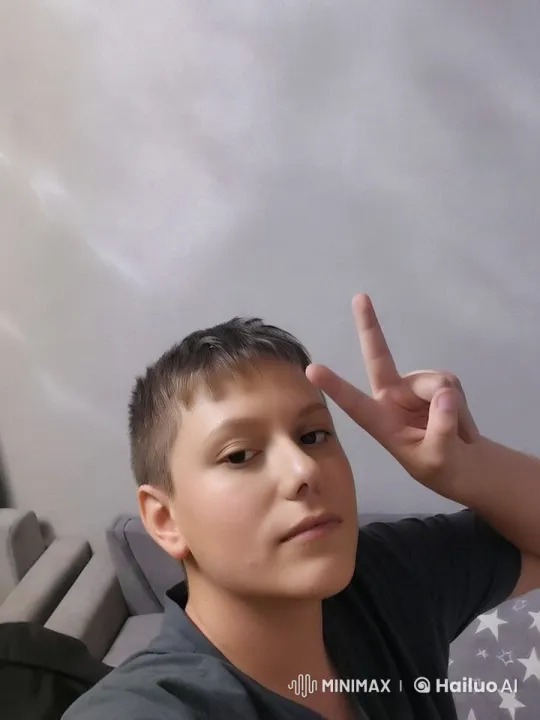 Animated Person Showing Peace Sign in Cozy Setting – AI Generated Video | Hailuo AI