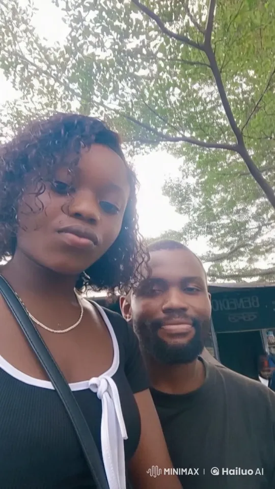 Two Musicians Enjoy a Serene Moment Under a Tree – AI Generated Video | Hailuo AI