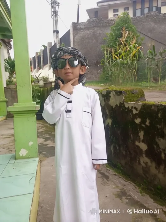 Young Boy Demonstrates Swift Kungfu Skills in Traditional Attire – AI Generated Video | Hailuo AI