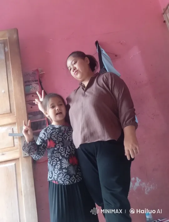 Woman and Child Perform Kung Fu in Animated Pink Room – AI Generated Video | Hailuo AI