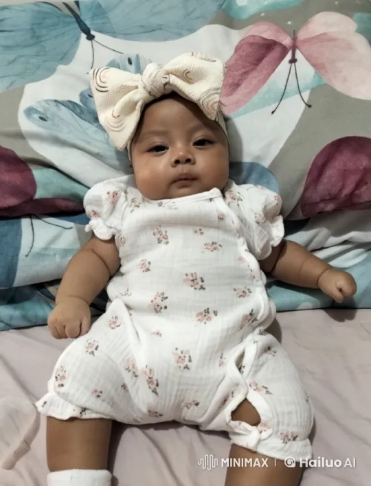 Baby's Gentle Dance in Soft Bedroom Setting – AI Generated Video | Hailuo AI