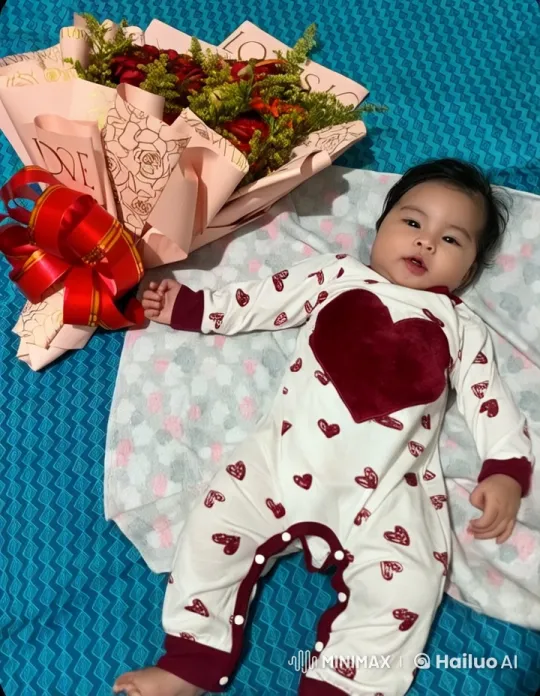 Baby in Onesie Dances Playfully Next to Flowers – AI Generated Video | Hailuo AI