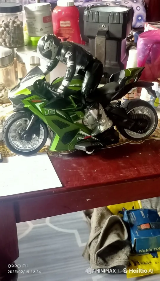Toy Motorcyclist on Vibrant Green Motorcycle - Live2D Animation – AI Generated Video | Hailuo AI