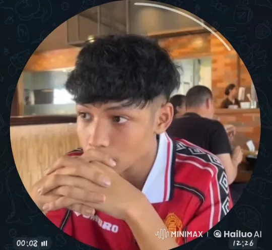 Cozy Diner Scene with Content Young Manchester United Fan – AI Generated Video | Hailuo AI
