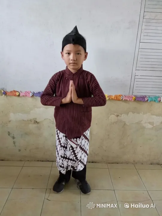 Young Boy in Traditional Attire Performs Kungfu in Classroom Setting – AI Generated Video | Hailuo AI