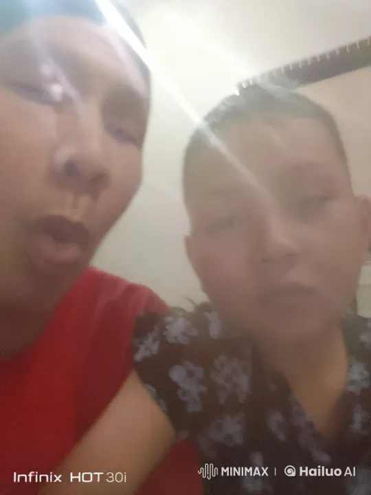 Animated Live2D Scene with Two Individuals in Cozy Indoor Setting – AI Generated Video | Hailuo AI