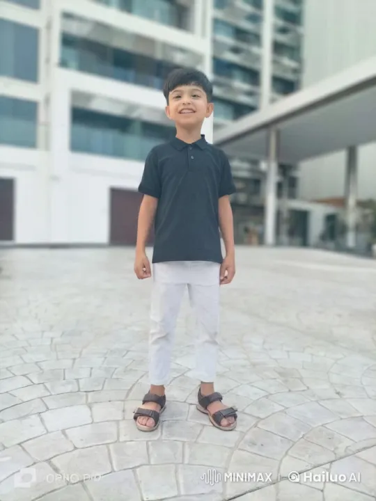 Young Boy Performing Kung Fu in Urban Setting – AI Generated Video | Hailuo AI