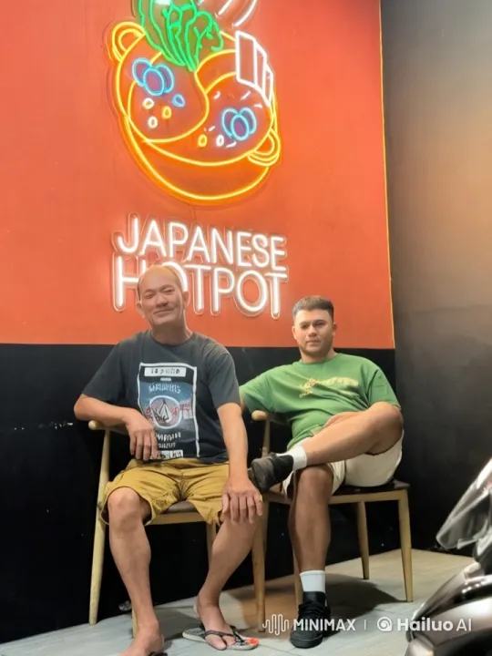 Dynamic Kungfu Performance Under Neon Japanese Hotpot Sign – AI Generated Video | Hailuo AI
