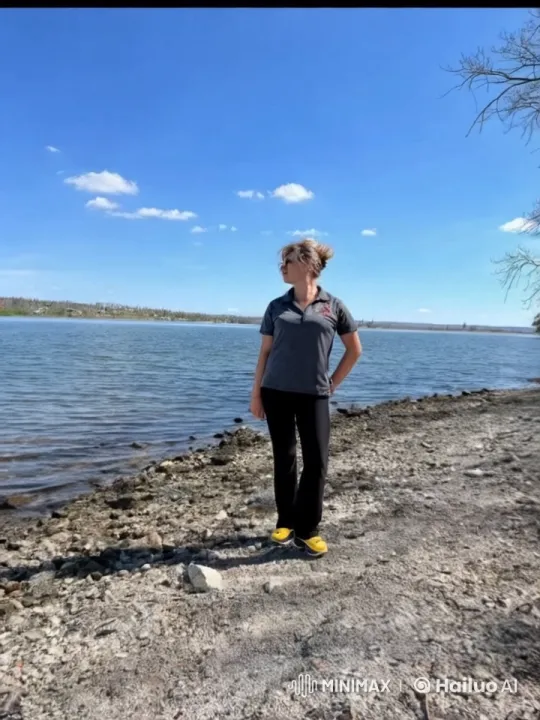 Woman and Companion Wolf by Serene Lakeshore – AI Generated Video | Hailuo AI