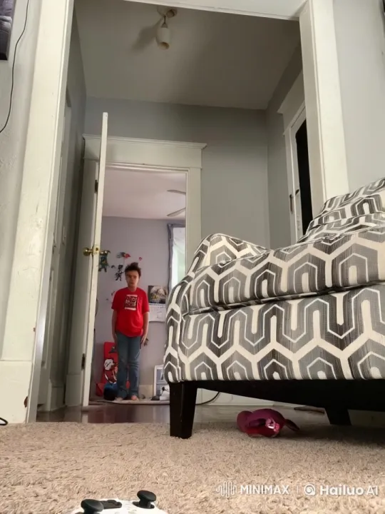 Boy in Red Shirt Runs Through Colorful Gaming-Themed Home – AI Generated Video | Hailuo AI