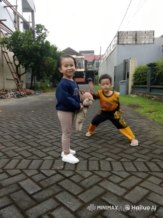 Suburban Children's Playful Kungfu Interaction – AI Generated Video | Hailuo AI