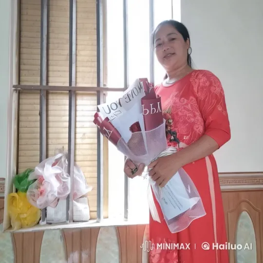 Woman Adjusts Flowers in Serene Live2D Animated Scene – AI Generated Video | Hailuo AI