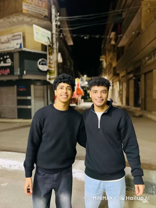 Vibrant Night Street: Friends Embrace in Animated Scene – AI Generated Video | Hailuo AI