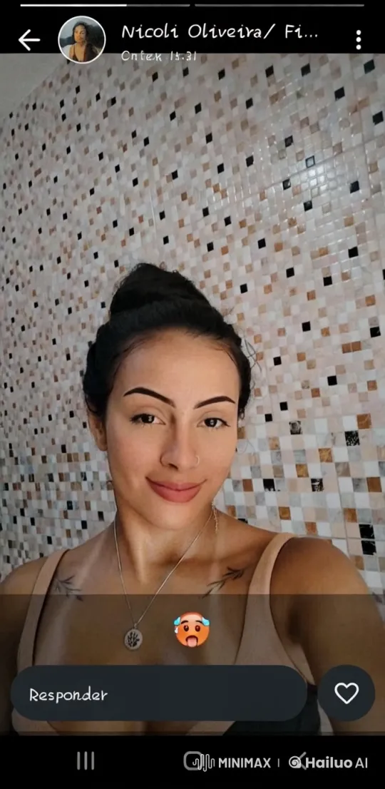 Woman with Tattoos in Casual Pose Against Patterned Wall – AI Generated Video | Hailuo AI