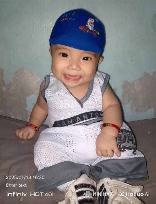 Infant in Colorful Attire on Cushion in Serene Room – AI Generated Video | Hailuo AI