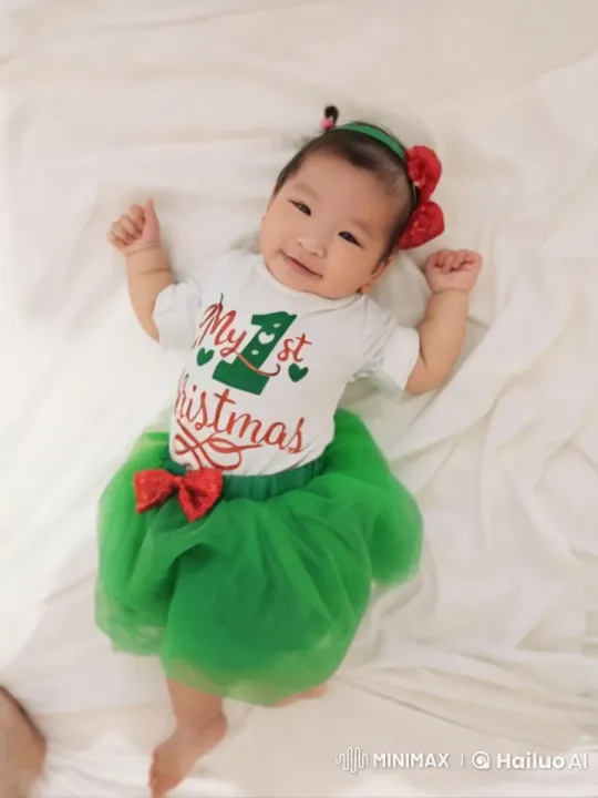 Baby's First Christmas Celebration in Festive Outfit – AI Generated Video | Hailuo AI
