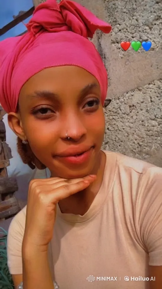 Woman in Pink Headscarf Demonstrates Impressive Kungfu Skills – AI Generated Video | Hailuo AI