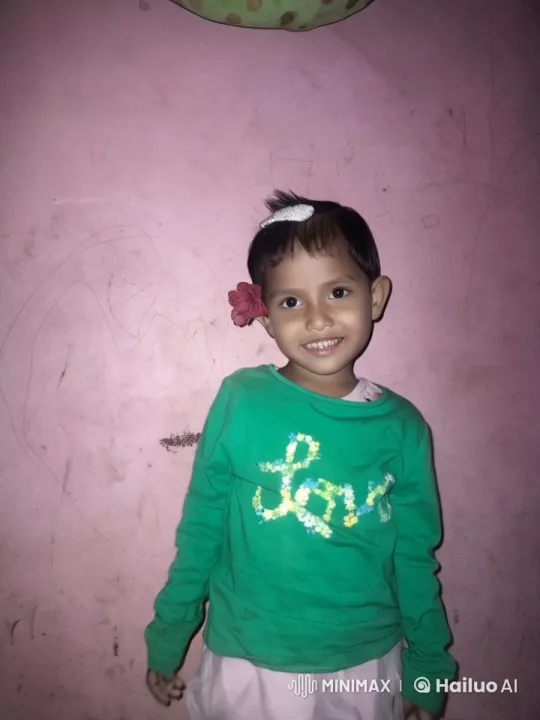 Child Plays Guitar Against Artistic Pink Wall – AI Generated Video | Hailuo AI