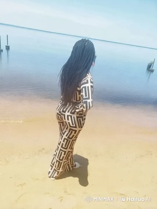 Peaceful Beach Scene with Animated Woman – AI Generated Video | Hailuo AI