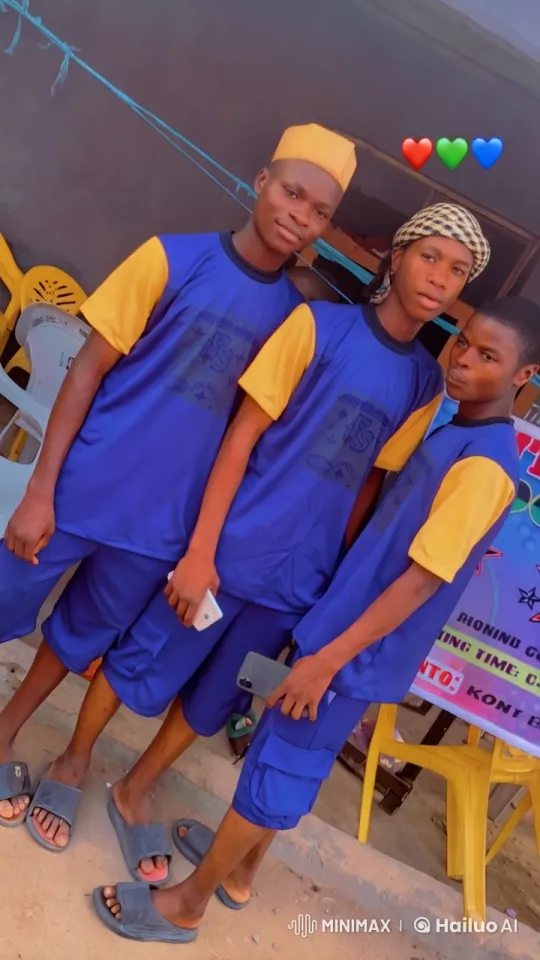 Three Young Men in Blue and Yellow Stand by Rope Wall – AI Generated Video | Hailuo AI