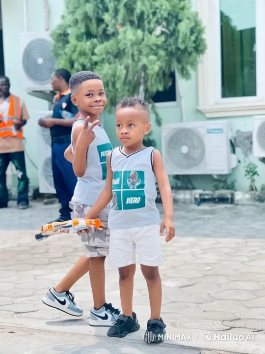 Boys Embrace Friendship with Toy Guns and Smiles – AI Generated Video | Hailuo AI