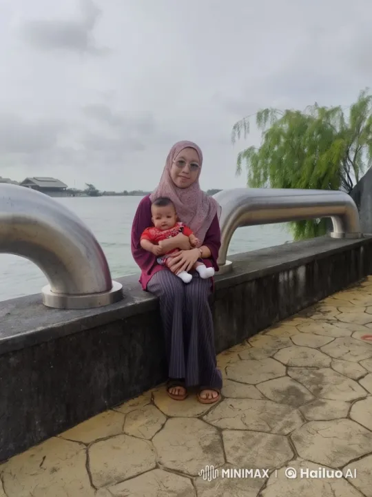 Kung Fu Display by Waterfront with Rocking Infant – AI Generated Video | Hailuo AI