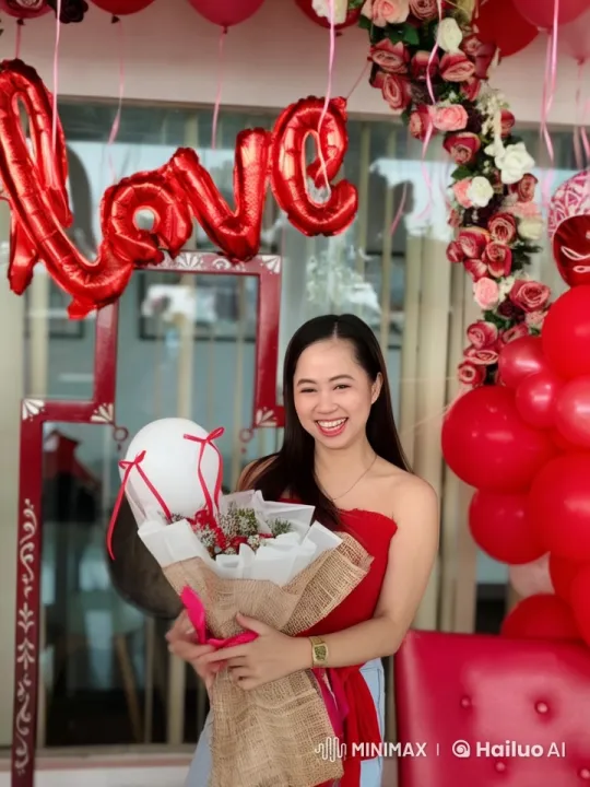 Woman Celebrates with Flowers and Dance Under 'Love' Sign – AI Generated Video | Hailuo AI